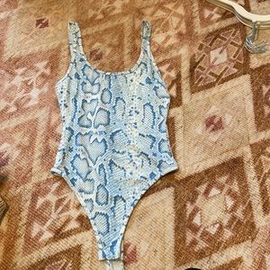Super down XS snake print bodysuit.